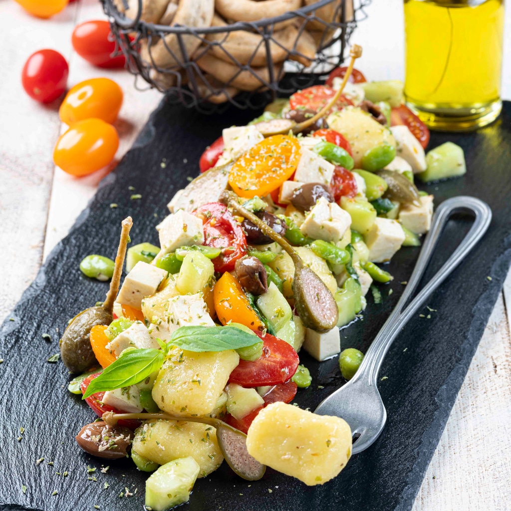 Traditional Patarò Gnocchi Salad With Cherry Tomatoes, Olives Broad Beans and Tofu