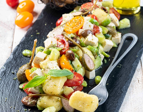 Traditional Patarò Gnocchi Salad With Cherry Tomatoes, Olives Broad Beans and Tofu