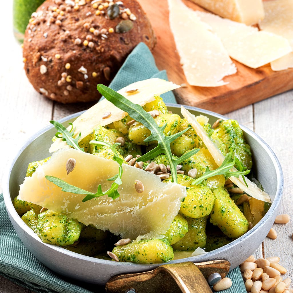 Gnocchi with Arugula Pesto and Toasted Sunflower Seeds