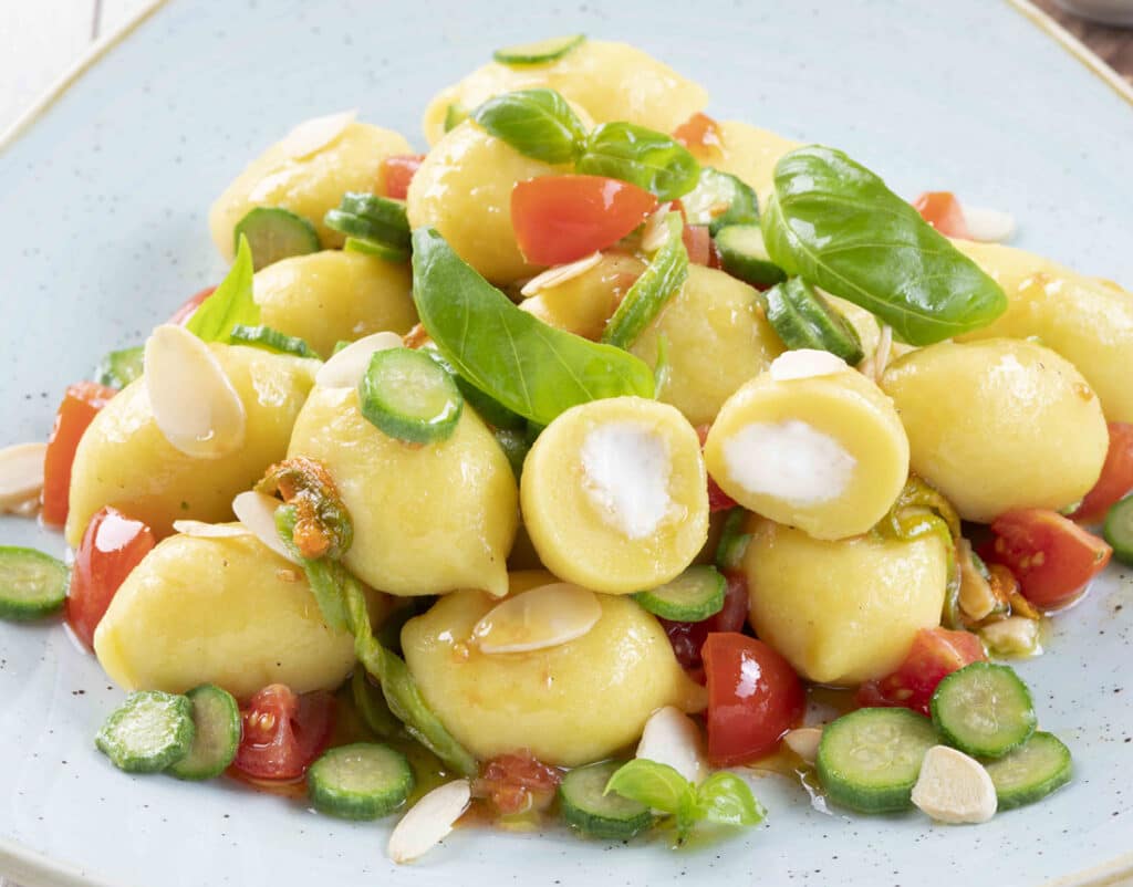 Italian Cheese Stuffed Gnocchi with Courgettes in Bloom, Fresh Tomato and Basil